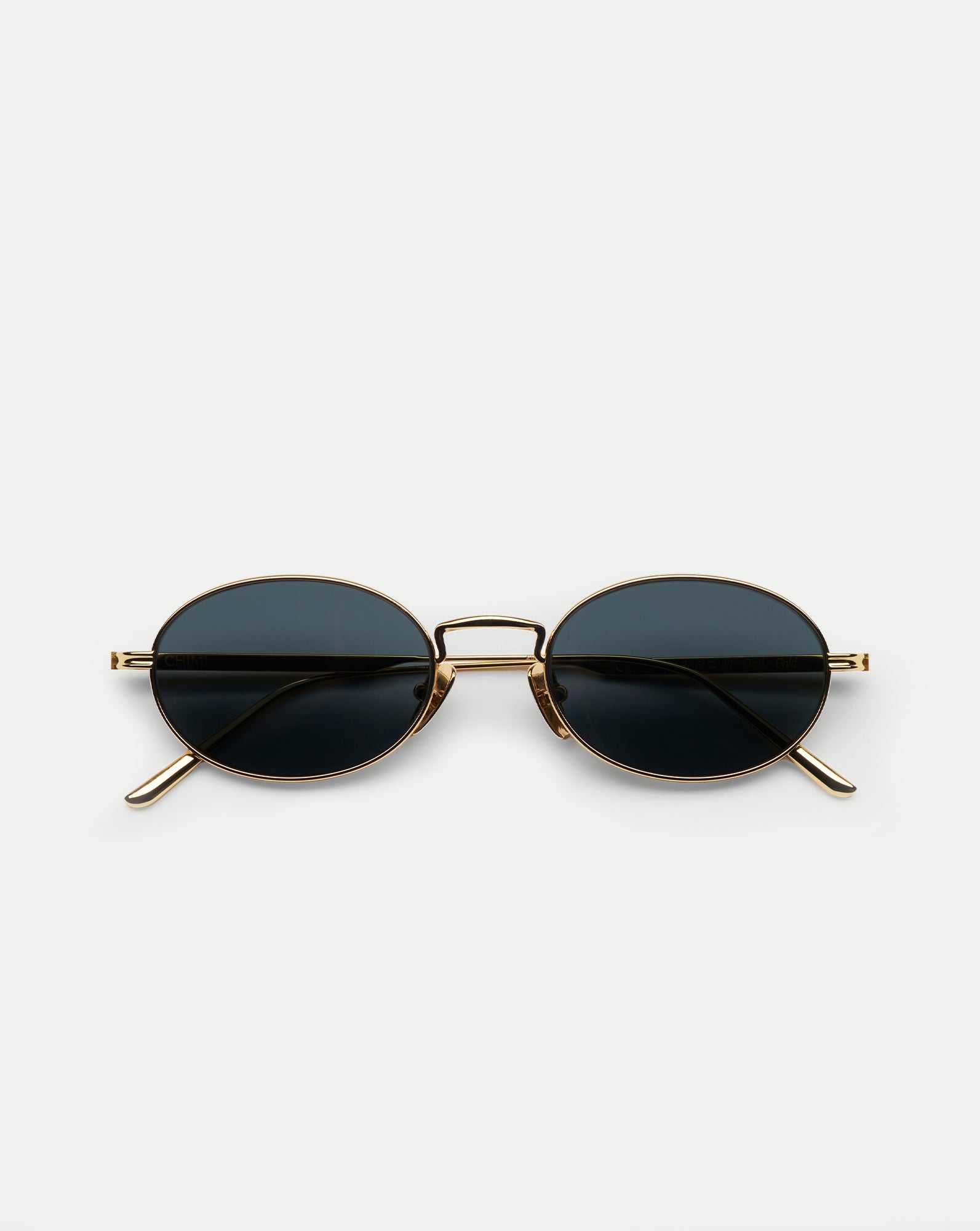 CC Titan Oval Sunglasses in Gold | Veronica Beard