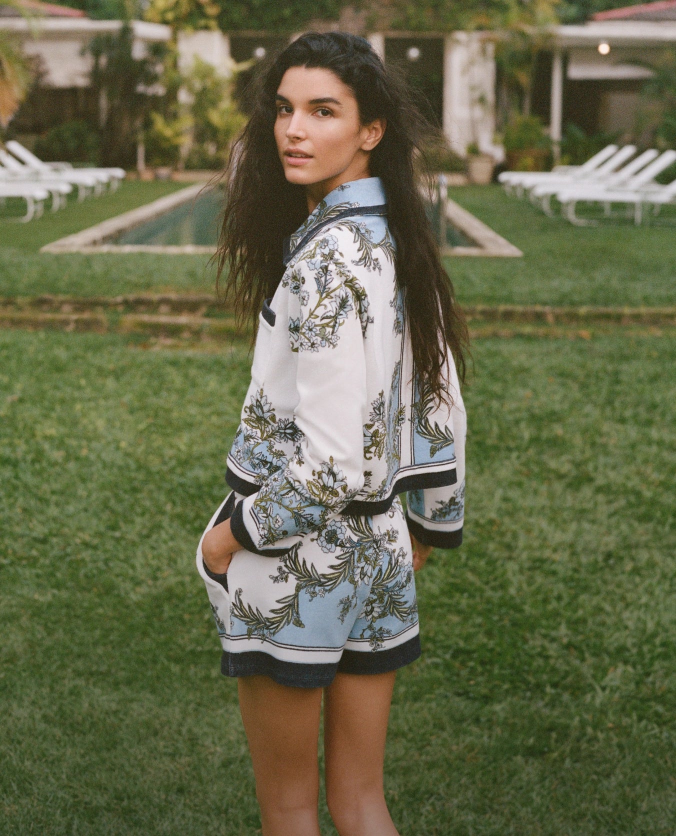Veronica Beard White and blue floral print pajama set with long-sleeve top and shorts.