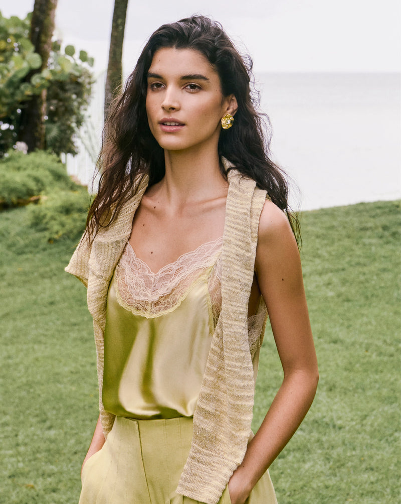 Veronica Beard Lime green silk camisole with a V-neckline and cream lace trim.