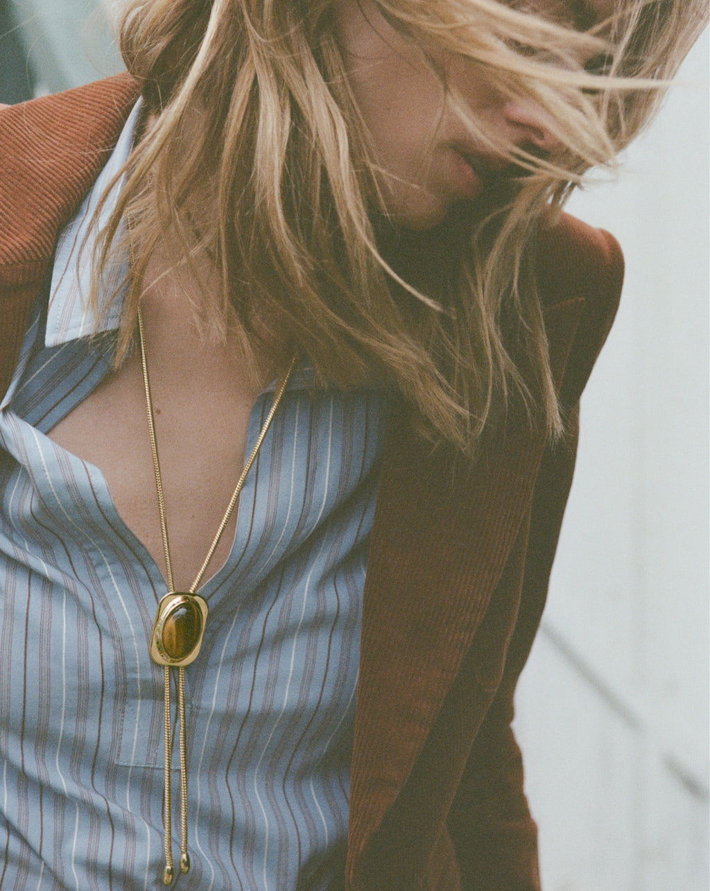Veronica Beard Gold snake chain necklace with oval center bead.