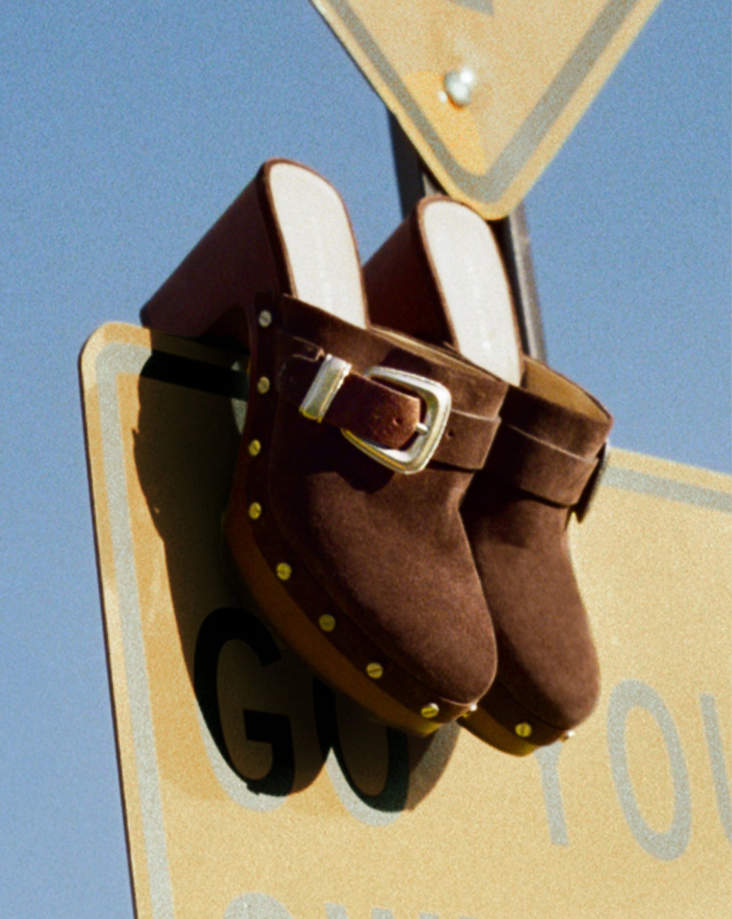 Veronica Beard Brown suede platform clog with silver stud detailing.