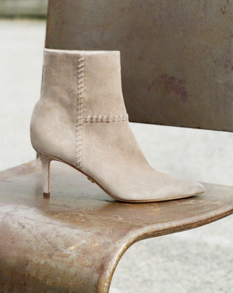 Veronica Beard Taupe suede ankle boots with gold zipper.