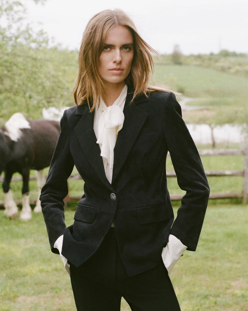Veronica Beard White silk blouse with pussy bow and cuff buttons.