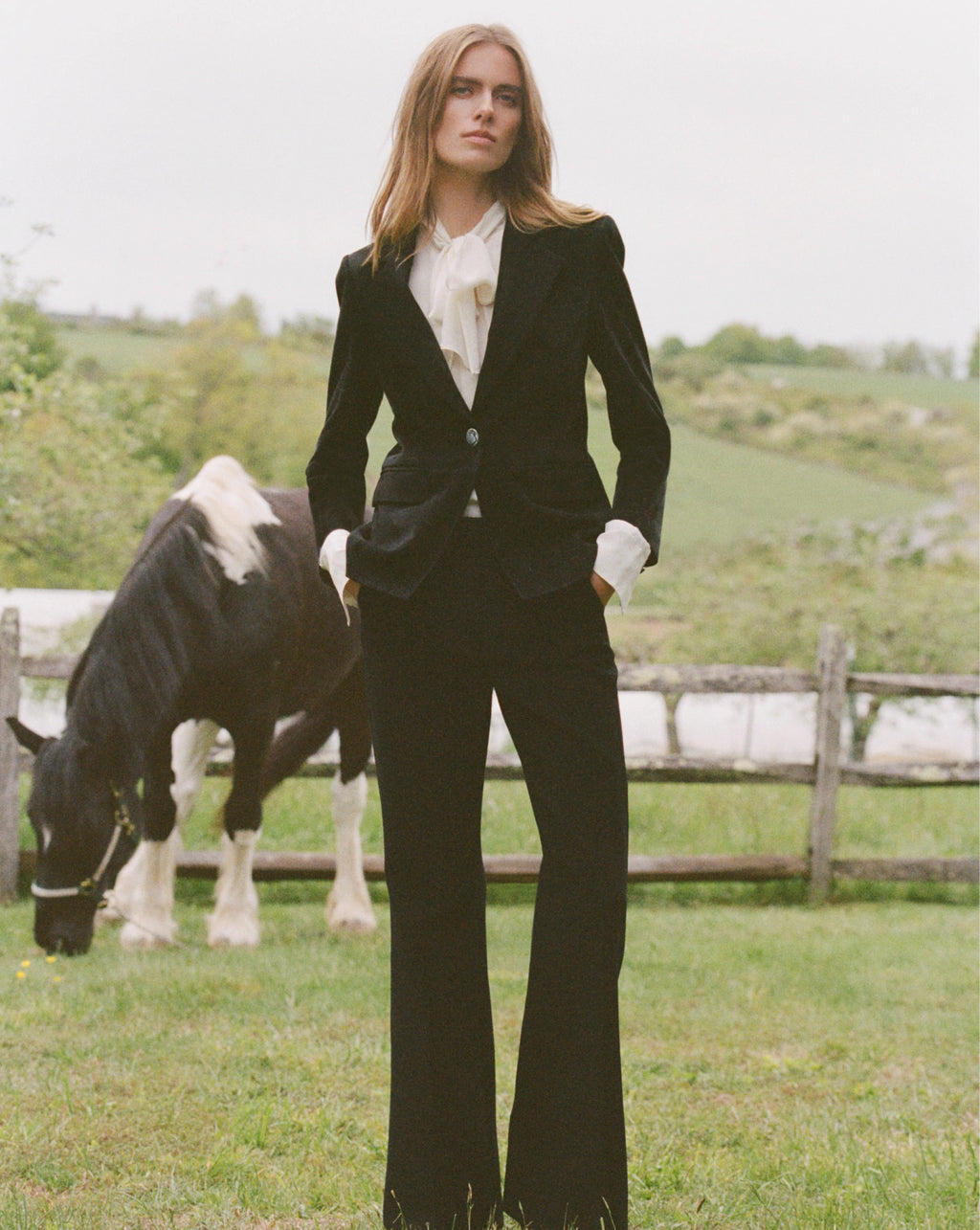 Veronica Beard Black suede blazer with three-button cuffs.