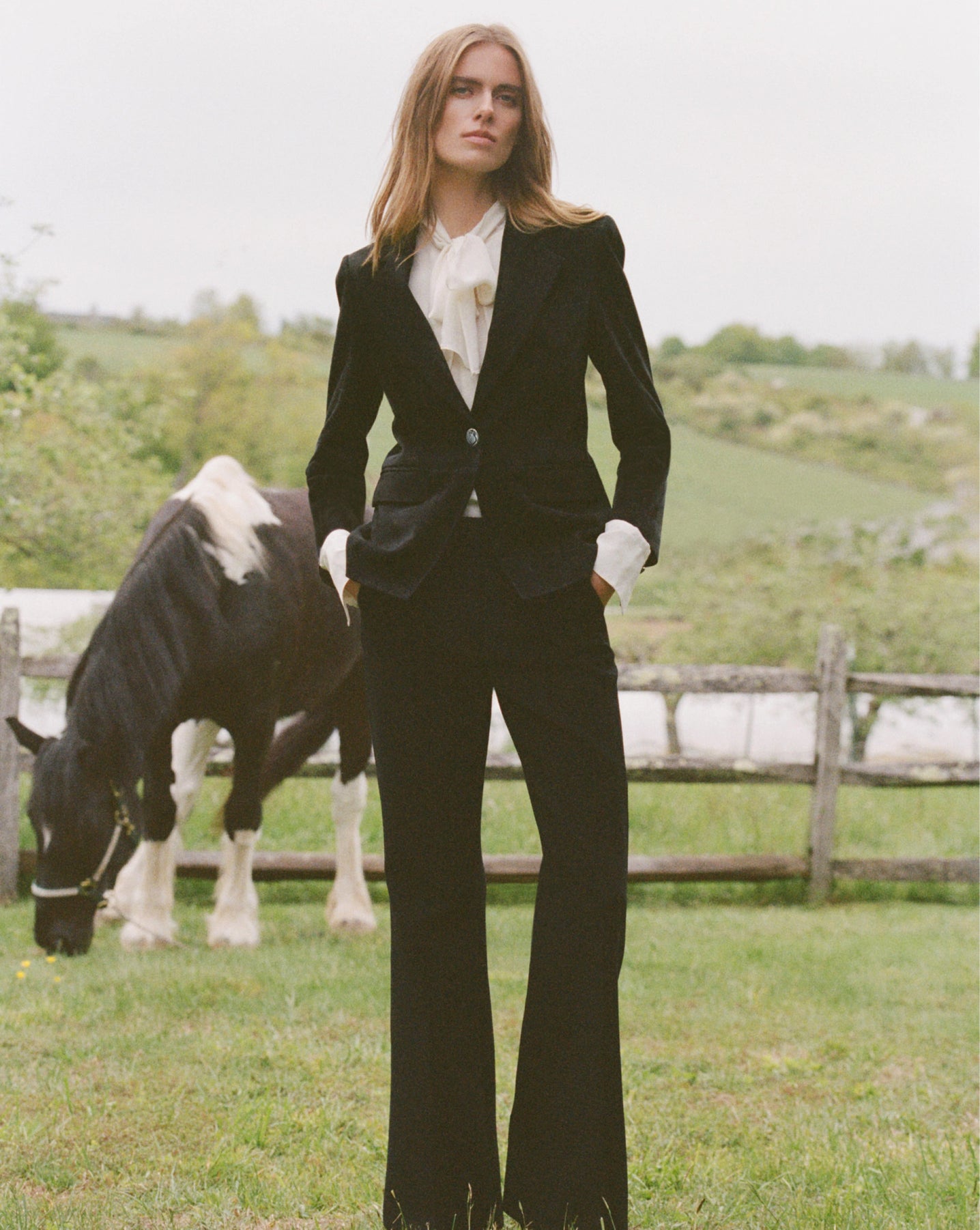 Veronica Beard Black suede blazer with three-button cuffs.