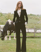 Veronica Beard Black suede blazer with three-button cuffs.