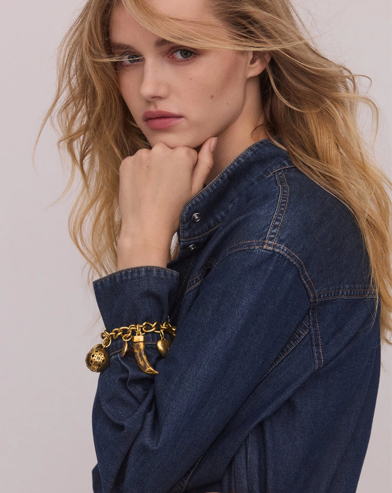 Veronica Beard Gold chain necklace with ornate teardrop charm.