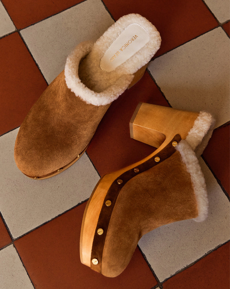 Veronica Beard Brown suede shearling-lined wooden heel clog shoes.