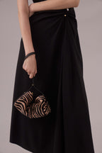 Veronica Beard Zebra print calf hair shoulder bag with gold zipper.