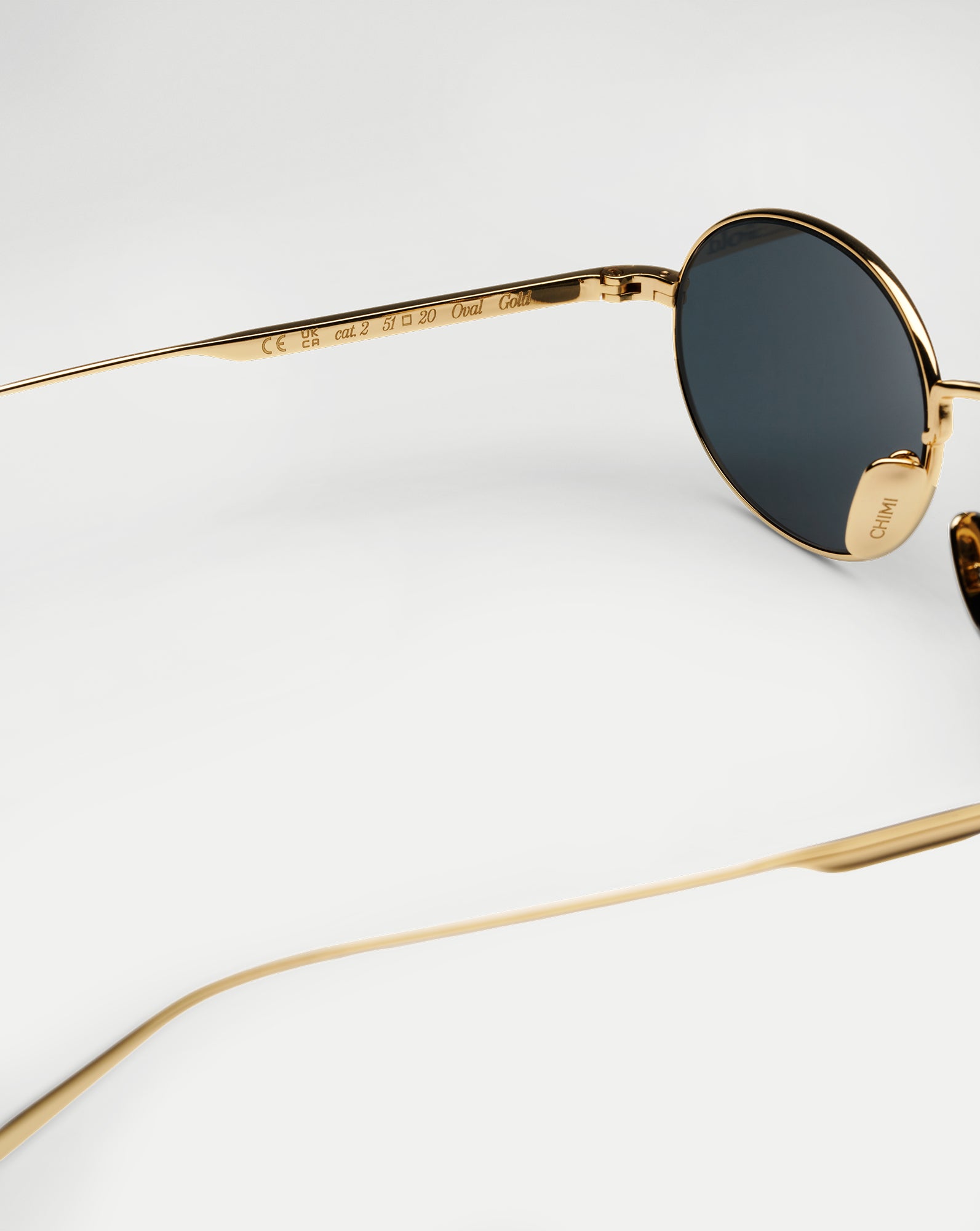 CC Titan Oval Sunglasses in Gold | Veronica Beard