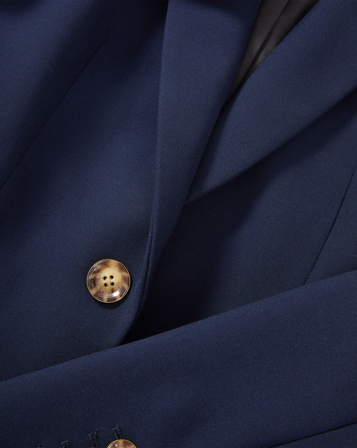 Veronica Beard Navy blue tailored blazer with marbled button.
