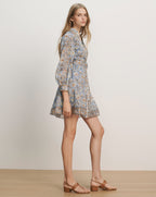 Veronica Beard Light blue floral print mini dress with long puff sleeves, a mandarin collar, and a tie waist.