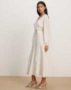 Veronica Beard White long-sleeve midi wrap dress with a V-neck and tie waist.