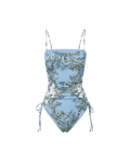 Veronica Beard Light blue one-piece swimsuit with white and green floral print, ruched sides, and adjustable ties.