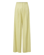 Veronica Beard Light green satin camisole with lace trim and matching wide-leg pleated trousers.