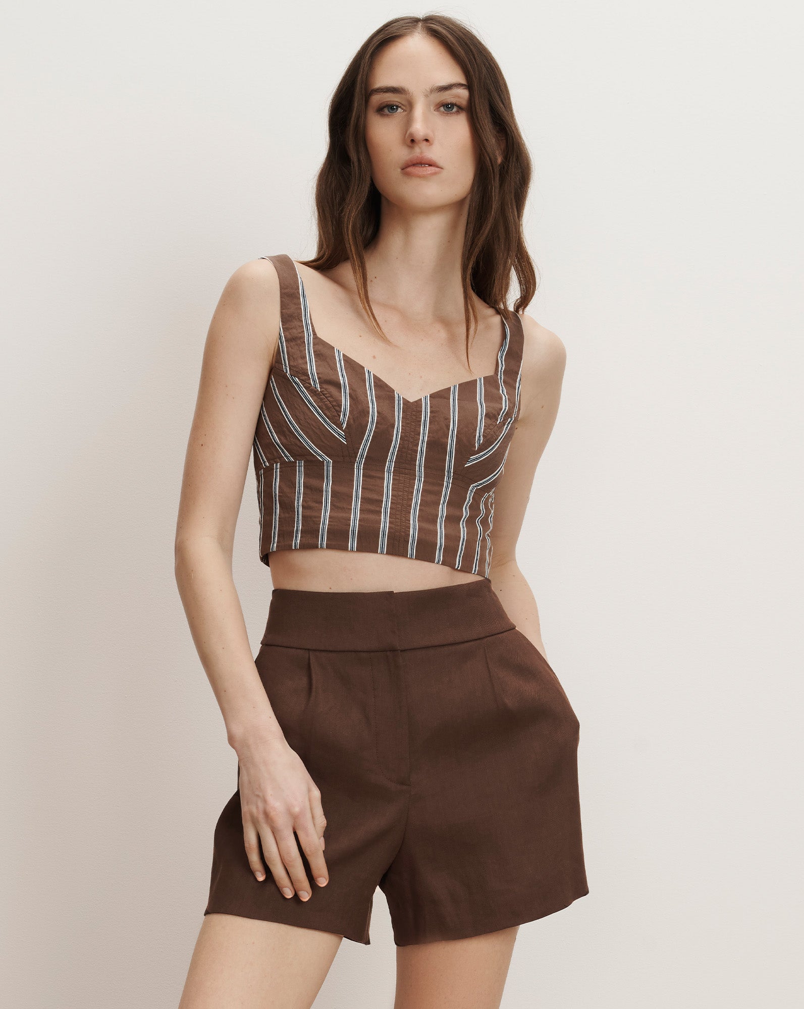 Veronica Beard Brown and white striped linen crop top with a sweetheart neckline and matching brown linen shorts.