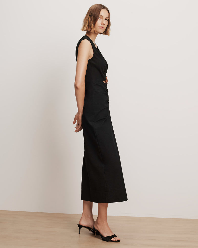 Veronica Beard Black sleeveless midi dress with side button details.