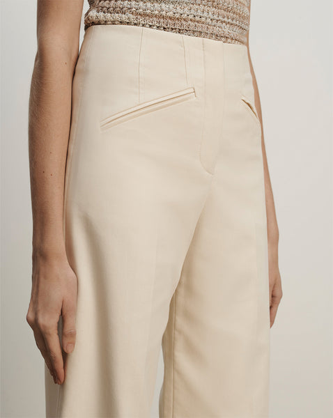 Veronica Beard Cream wide-leg trousers with angled front pockets.
