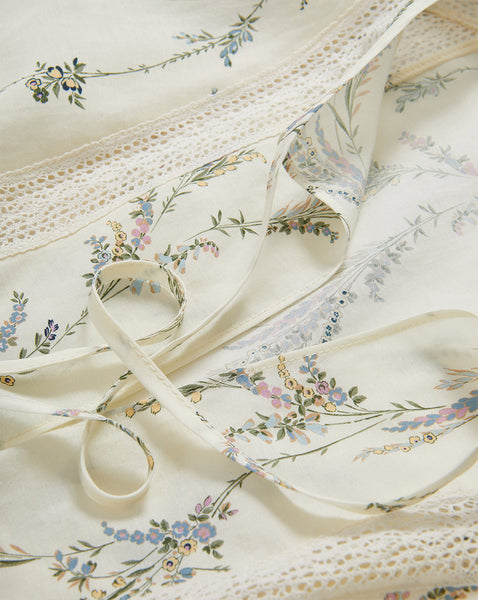 Veronica Beard Cream floral print cotton dress with lace trim.