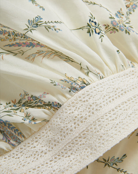 Veronica Beard Cream floral print dress with lace trim.