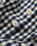 Veronica Beard Navy and white gingham vest with cream buttons.