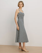 Veronica Beard Black and white gingham midi dress with spaghetti straps.