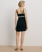 Veronica Beard Black mini dress with braided straps and waist trim.