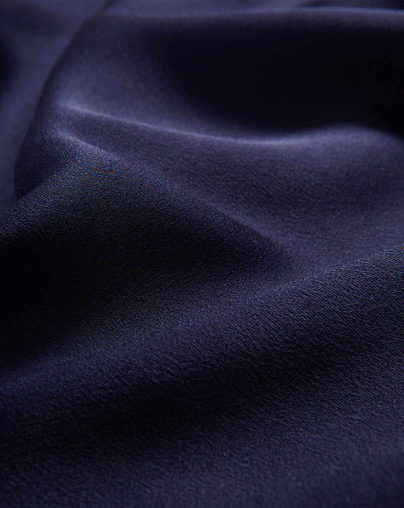 Veronica Beard Navy blue silk top, draped, with subtle sheen.