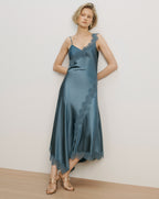 Veronica Beard Teal satin slip dress with lace trim.