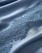 Veronica Beard Blue satin dress with intricate lace trim.