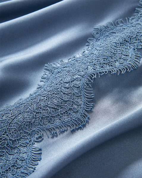 Veronica Beard Blue velvet fabric with a scalloped lace trim.