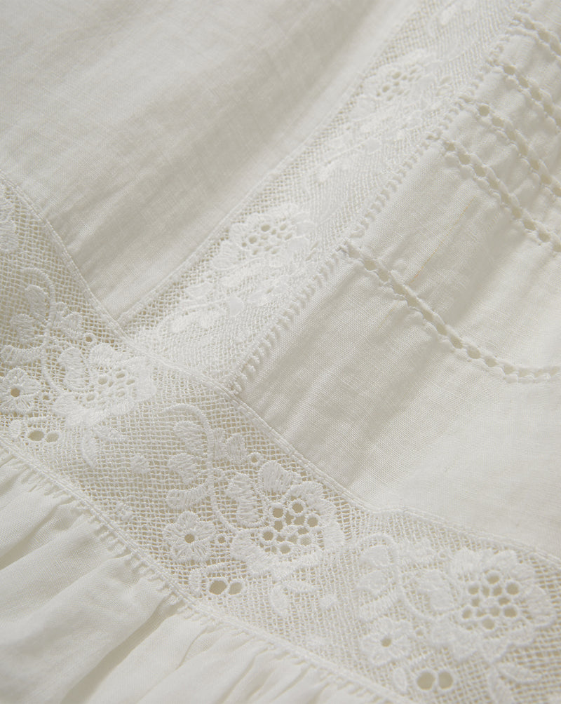 Veronica Beard White linen dress with lace trim.