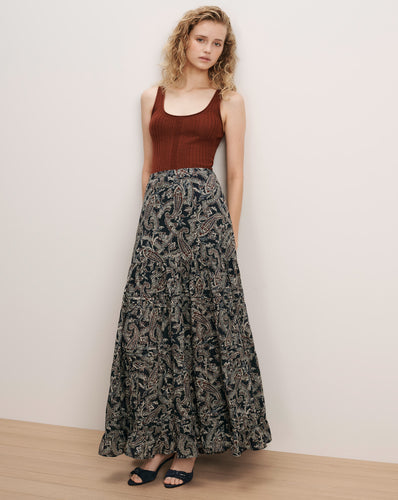Veronica Beard Brown ribbed tank top, black paisley maxi skirt.