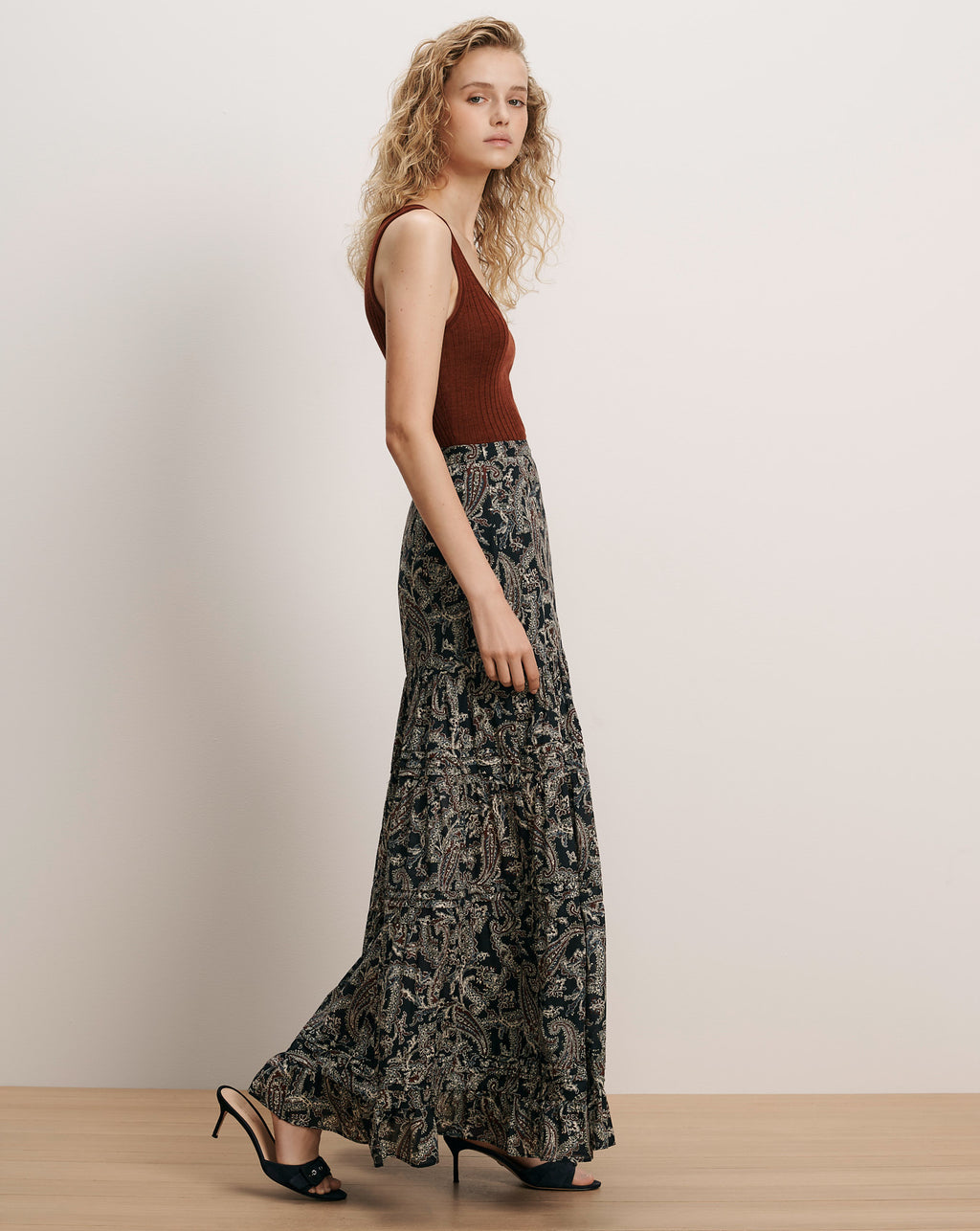 Veronica Beard Brown knit tank top and black paisley maxi skirt.