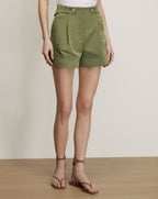 Veronica Beard Olive green pleated shorts with button details.