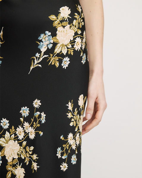 Veronica Beard Black floral midi skirt with cream and blue flowers.
