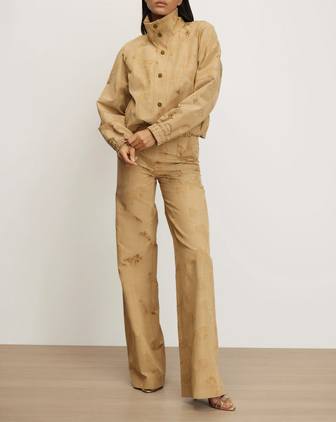 Veronica Beard Tan floral embroidered jacket and wide-leg pants.