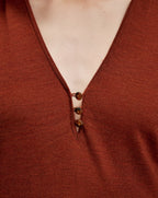 Veronica Beard Brown knit top with V-neck and three buttons.