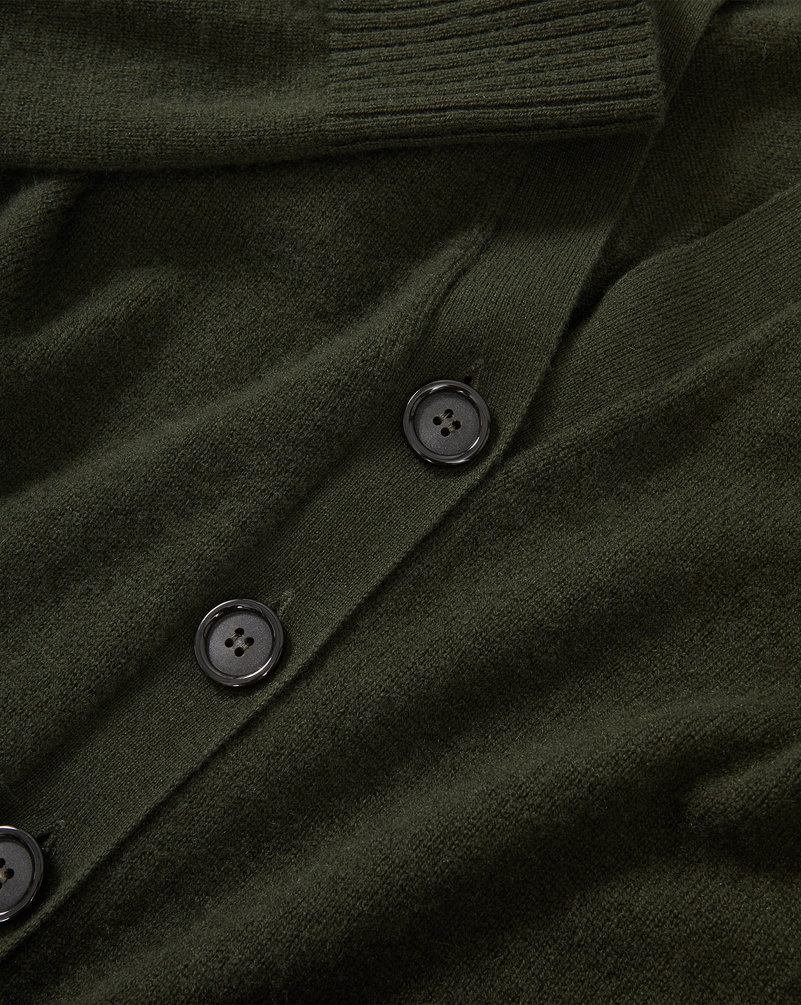 Veronica Beard Dark green cardigan with black buttons.