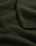 Veronica Beard Dark green knit sweater with ribbed cuff.