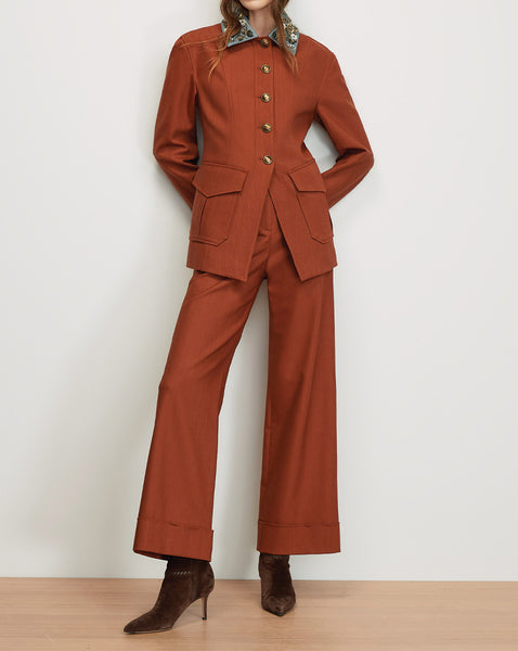 Veronica Beard Rust wool suit with embroidered collar and gold buttons.