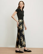 Veronica Beard Black floral maxi skirt with a black t-shirt.