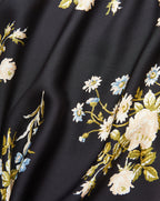 Veronica Beard Black floral maxi skirt with a black t-shirt.
