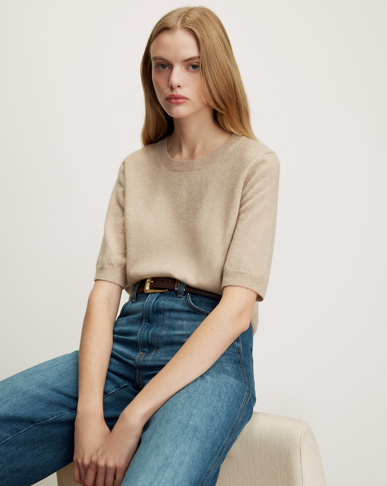 Veronica Beard Beige short-sleeve knit top with a crew neck.