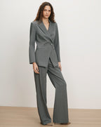 Veronica Beard Gray double-breasted suit with wide-leg pants.