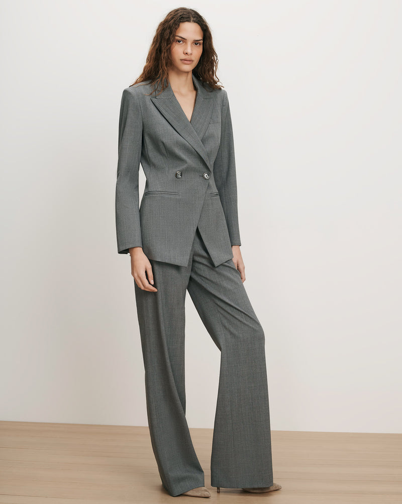 Veronica Beard Gray double-breasted suit with wide-leg pants.