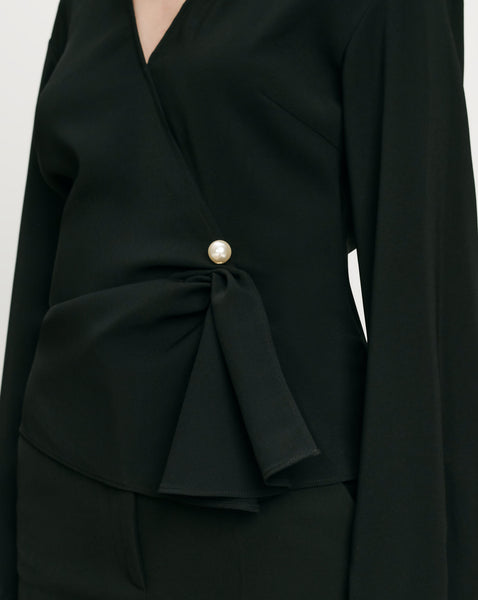 Veronica Beard Black wrap blouse with pearl button