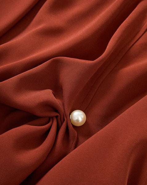 Veronica Beard Rust blouse with pearl button detail