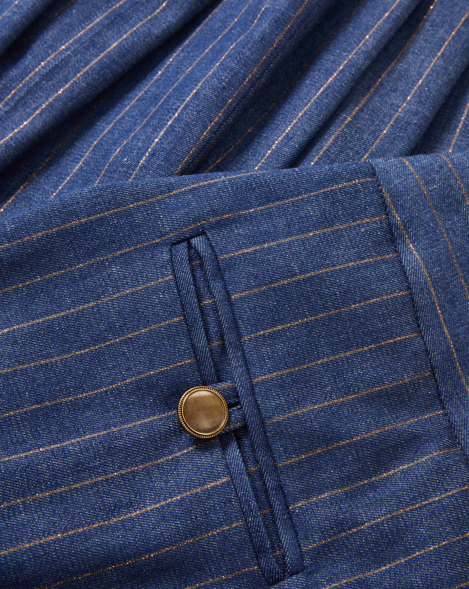 Veronica Beard Blue pinstripe trousers with a single button closure.