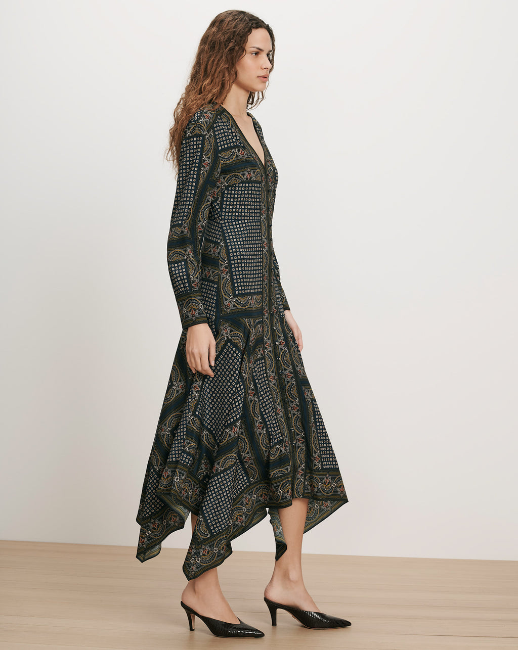 Veronica Beard Black patterned midi dress with handkerchief hem.